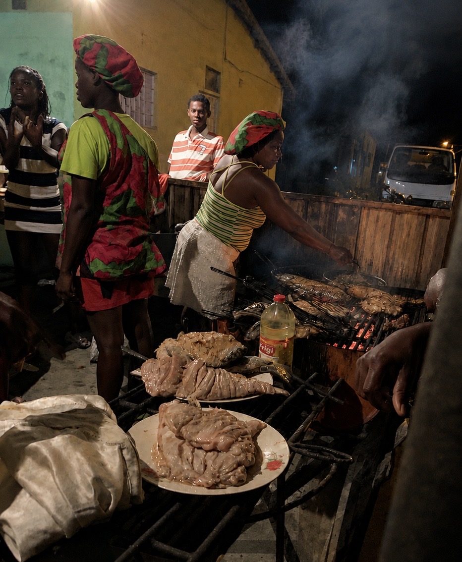 women grilling fish in Sao Tome